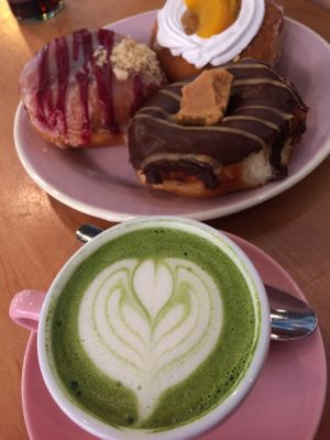Matcha latte with blueberry, peaches and cream and peanut butter fudge donuts  at Brammibal's Donuts - Potsdamer Platz in Berlin