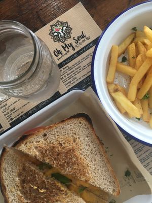 Toasted cheese, tomato and basil on sourdough   at Oh My Soul Cafe in Durban