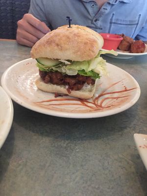 Vegan orange chicken burger  at Lotus Vegetarian in Chantilly