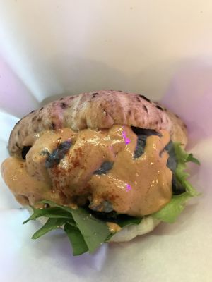 A shot of the “brother’s sandwich” with spicy sesame dressing, and various fillings/toppings  at Falafel Brothers - Ebisu in Tokyo
