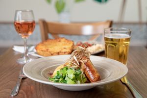 Sausage and mash -
Butcher’s pork & leek sausages with vegetables and onion gravy (Vegan & DF) - daily meals at Perrywood Garden Centre in Inworth