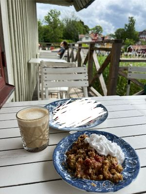 apricot crumble cake with vegan whipped cream and oat milk chai latte  at Hembygdsgårds Café in Vaxholm