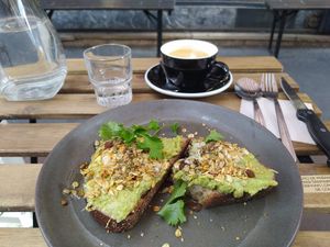 Avocado on toast with homemade cheese at Grounded in Paris