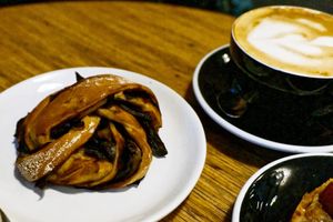 Onion/Balsamic Vinegar Roll + Flat White at Grounded in Paris