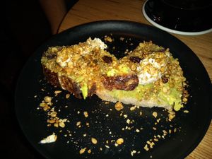 Avocado toast with granola topping at Grounded in Paris