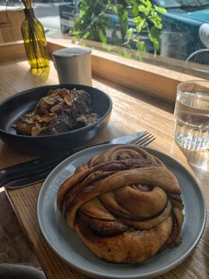 Breakfast toast and cinnamon roll at Grounded in Paris