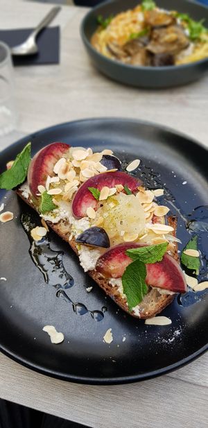 Ricotta and peach toast at Grounded in Paris