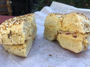 Everything bagel with hummus, artichoke hearts, and red onion  at Biff's Bagels in Flagstaff