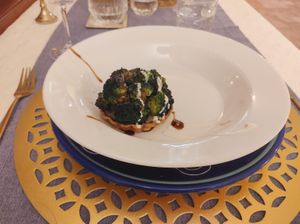 Tortino di pasta friabile con crema di porcini selvatici e broccoli at Emanuele Di Biase in Perugia