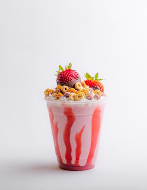 Strawberry Shortcake Shake: strawberry shake topped with whipped cream, Frooty Loops cereal, and a chocolate covered strawberry! Almond-based whipped cream is optional. at Stand-Up Burgers in Berkeley