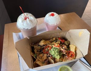 Vegan nachos with taco “meat” and a chocolate and strawberry shake  at Stand-Up Burgers in Berkeley
