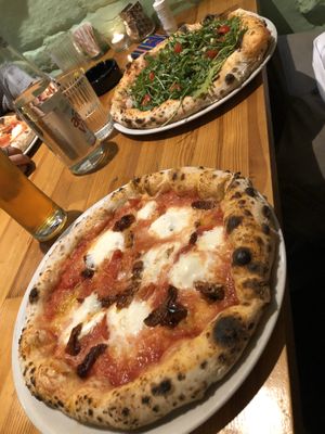 Magarita with mozarella buffala and vegan pizza with ruculla and vegetables. Both very good. at Majstor i Margarita in Belgrade