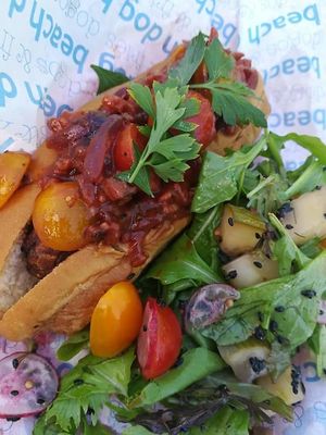Fila Dog
Delicious lentil sausage, BBQ sauce, Cherri tomatoes , red onion,  vegan bacon at Beach Dog in San Jose Del Cabo