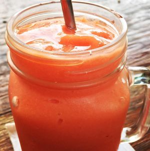 Guava, passion fruit, papaya, orange juice, sour sop and basil seed smoothie  at Green Guru in Canggu