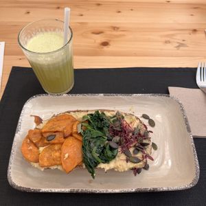Green smoothie and hummus toast  at Zazie in Verona