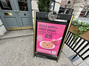sign  at Pizza Express - Baker St in London
