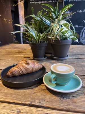 Croissant and cappuccino with oatmilk  at The Greens in Berlin
