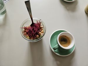 Vegan salad and a cappuccino at The Greens in Berlin
