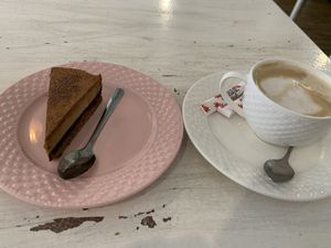 Tiramisu cake and cappuccino with soy milk at Sublimmme in Bucharest
