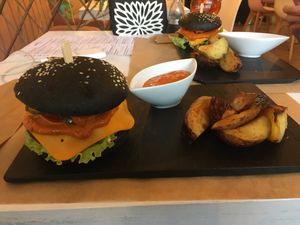 Burger with potatoes at Sublimmme in Bucharest