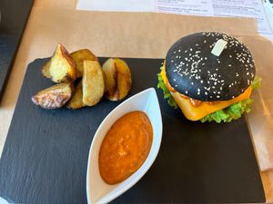 Burger with potatoes at Sublimmme in Bucharest