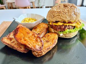 Protein burger with sweet mustard and wedges at Sublimmme in Bucharest
