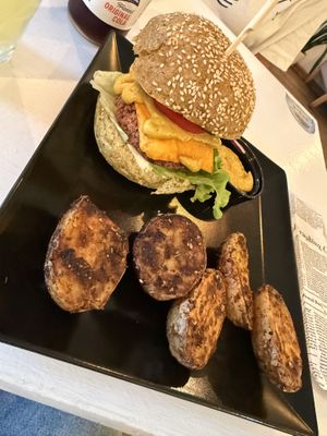 Mustard burger and potatoes   at Sublimmme in Bucharest