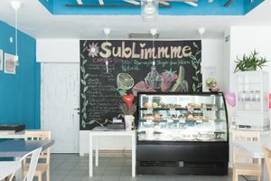 Beautiful showcase with many colorful and delicious cakes at Sublimmme in Bucharest
