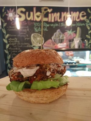 Vegan delicious burger with plenty of vegetables and vegan mayonnaise. at Sublimmme in Bucharest