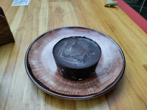 Dark chocolate peanut cake. at Alma Natura in Medellin