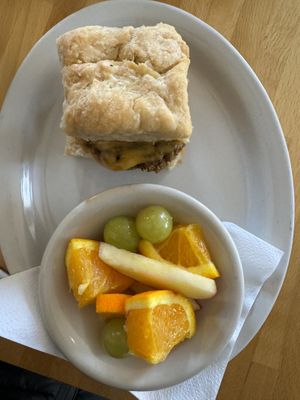 Breakfast Sammie and fruit cup  at Vegan East in Minneapolis