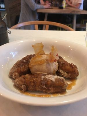 Banana fritters with salted date ice cream, pineapple caramel & chilli praline. at Suncraft in Bristol