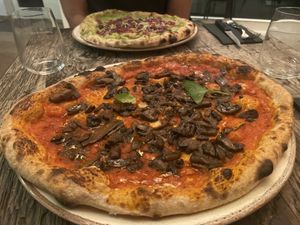 Margarita with no cheese and added mushrooms  at Amuni in Bruges