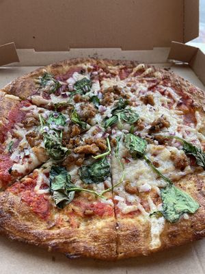 Vegan cheese, tomato sauce, beyond crumbles, red onion and spinach at Oath Pizza in Somerville