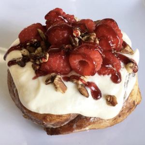 Amaretto Frosting with Raspberries & Pecans! at Cinnaholic in Winnipeg