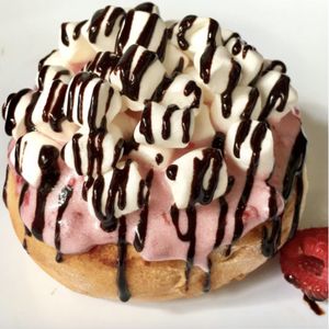 Raspberry Frosting, Mini Marshmallows & Chocolate Sauce! at Cinnaholic in Winnipeg