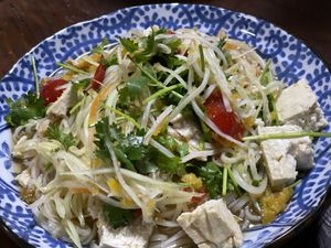 Ordered new summer menu Somtam noodle by delivery app. It comes with plant-based protein topping and big tofu!  at Ssong Thai in Seoul