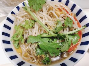 Lemon grass soup in a bowl, ordered from home.  at Ssong Thai in Seoul