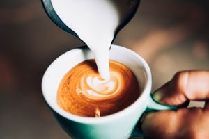 Single Origin Coffee with oatmilk at Karma Food - Ausstellungsstrasse in Vienna