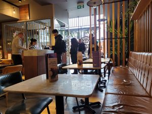 Tables close to the entrance at Pizza Express - Euston Rd in North West London