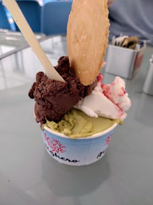 Fondente (dark chocolate), pistachio, strawberry cheesecake at Azzurra Ice Cream in Alghero