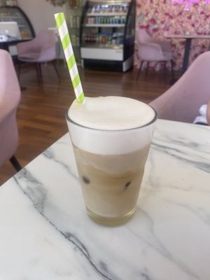 Oat milk iced latte + vanilla syrup   at Creme Cafe in Lanzarote