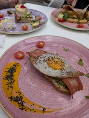Avocado toast with vegan fried egg and bacon at Creme Cafe in Lanzarote