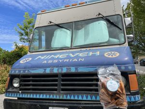 Creative photography with their bag of pita chips (received a big thumb up for this)  at Nineveh Assyrian - Food Truck in Olympia