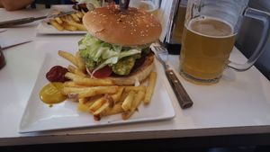 Yala yala kaput (falafel burger) french fries and craft beer. at Vegan Dealer in Santiago
