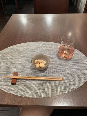 Plum sake as the drink in the set menu, came with some nice nut snacks  at Saido in Tokyo