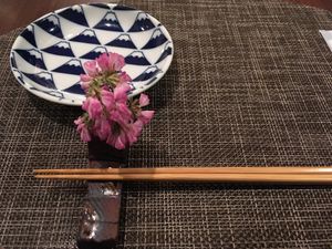 Each place setting has a different flower at Saido in Tokyo