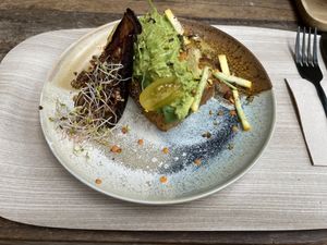 Avocado toast, I asked to take out the egg and the feta to make it completely vegan.   at Peanut's Café in Sainte-maxime