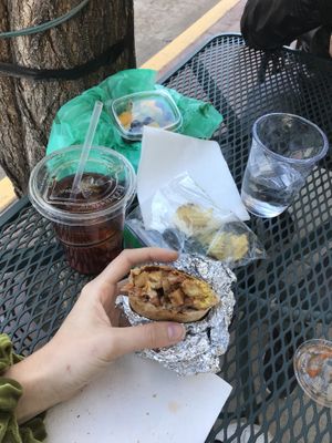 Delicious burrito served w/ salsa & fresh fruit at Sita's Kitchen  in Trinidad
