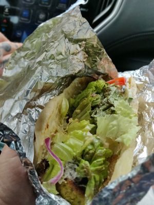 Amazing Falafel sandwich; best falafel I've had which was crunchy on the outside and fluffy on the inside. The flatbread was delicious! at Sita's Kitchen  in Trinidad